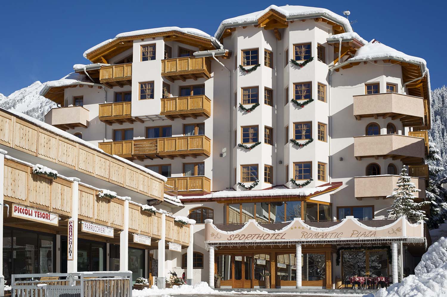 Sporthotel Romantic Plaza, Madonna di Campiglio - hotel exterior in traditional Alpine style