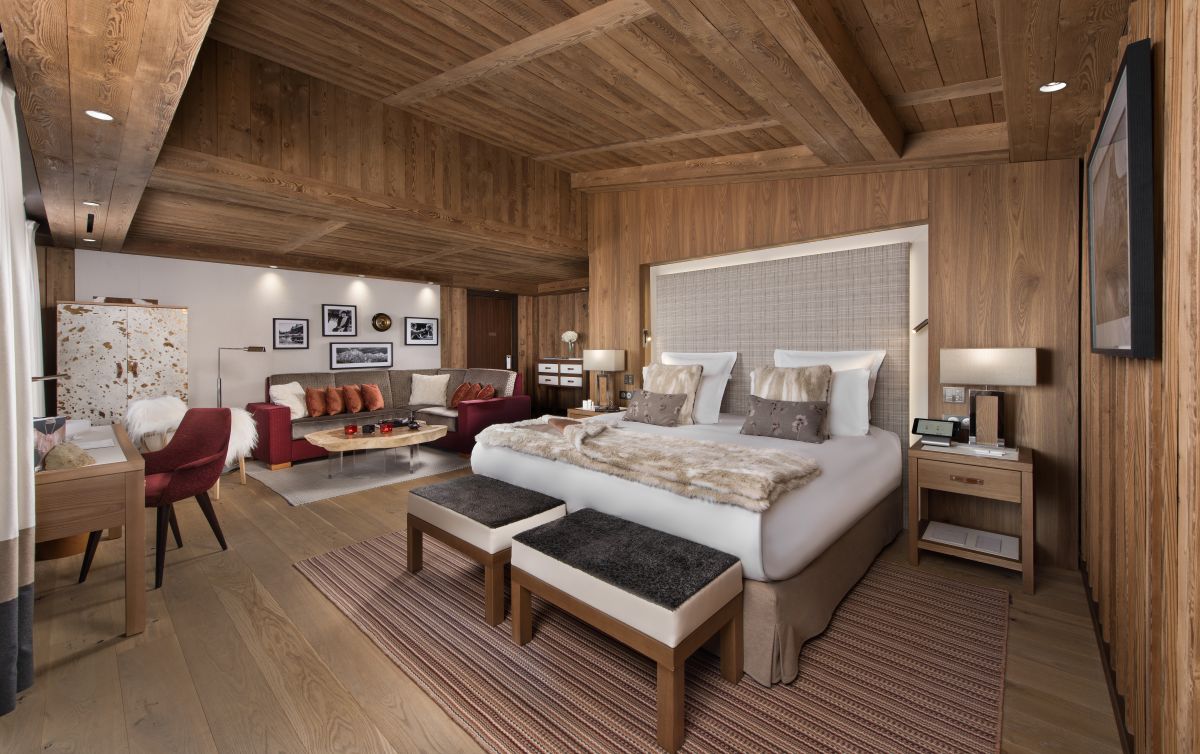 Hotel Fouquet's Courchevel - Penthouse double bedroom with sofa area wardrobe writing desk and large window