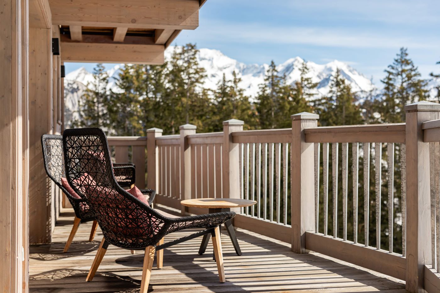 Hotel Le K2 Altitude Courchevel - private balcony with seats a table and mountain views