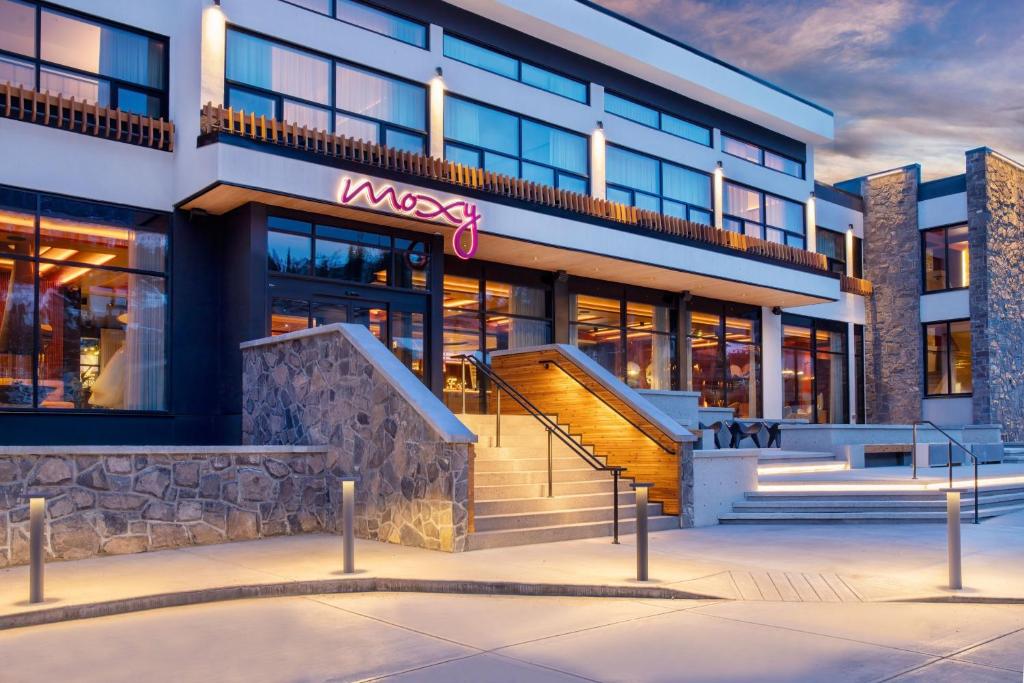 Exterior of the Moxy Banff hotel at dusk